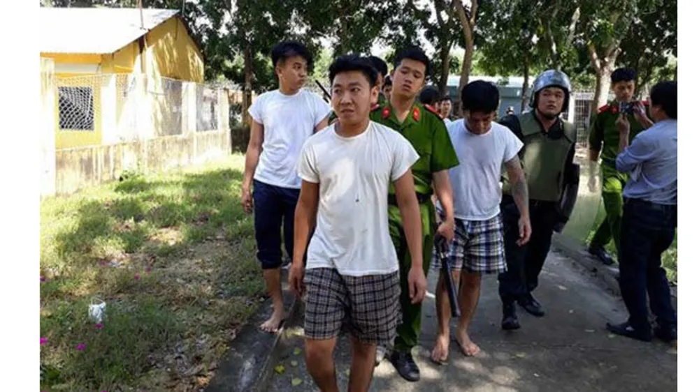 Các học viên trốn trại được công an đưa trở lại trại