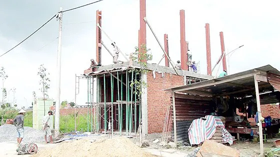 Một công trình nhà ở riêng lẻ đang được xây dựng. Ảnh minh họa