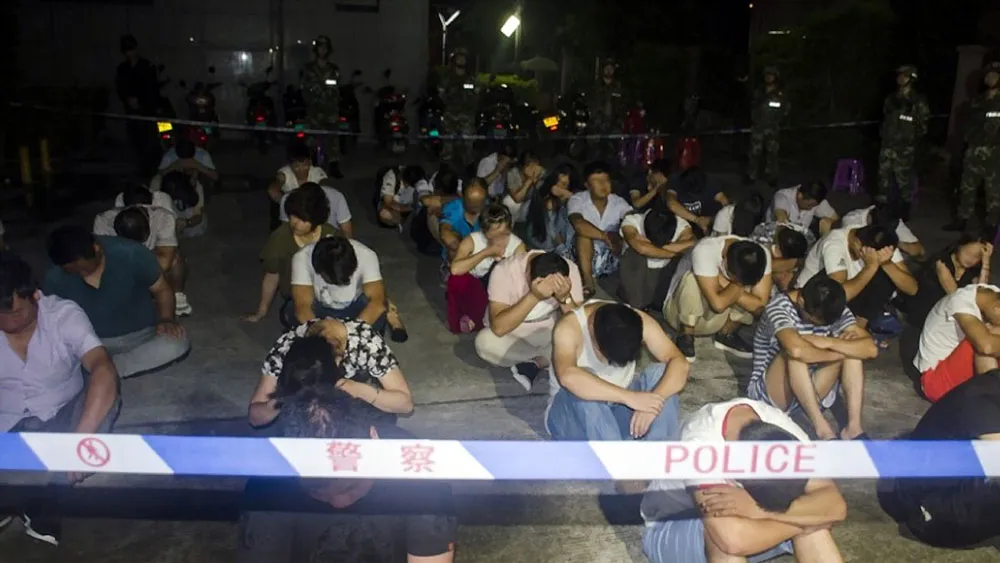 Hình ảnh vụ truy bắt đối tượng tham gia đường dây lừa đảo đa cấp ở TP Bắc Hải, khu tự trị dân tộc Choang, Quảng Tây, Trung Quốc