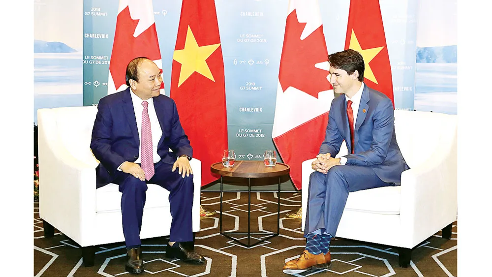 Thủ tướng Nguyễn Xuân Phúc hội đàm với Thủ tướng Canada Justin Trudeau. Ảnh: TTXVN