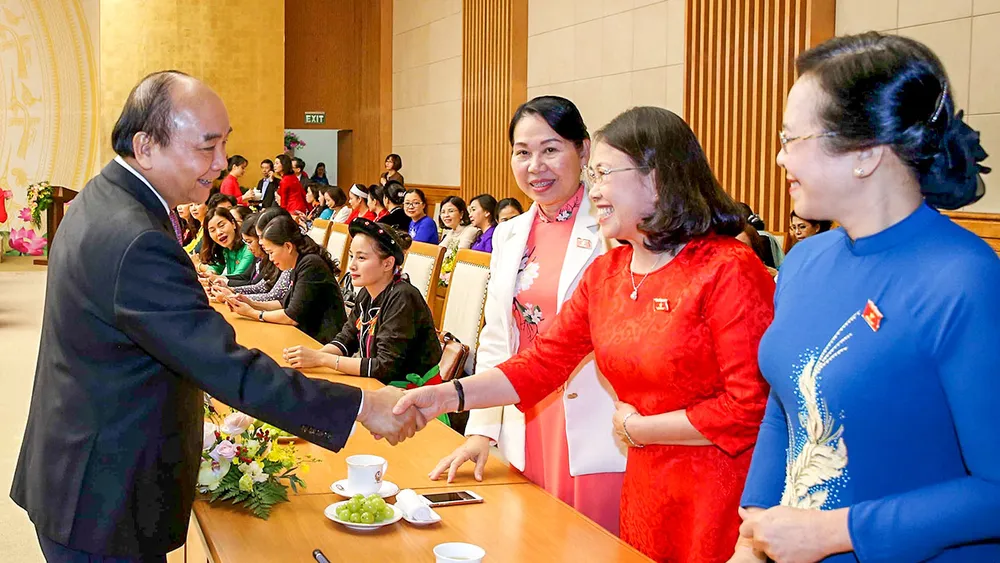 Thủ tướng Nguyễn Xuân Phúc và các đại biểu tại buổi gặp mặt. Ảnh: TTXVN