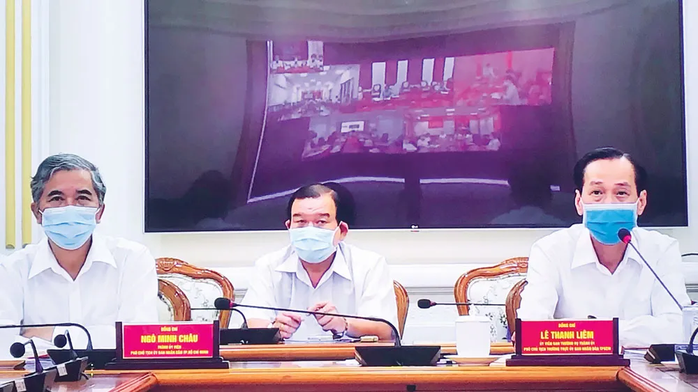 Phó Chủ tịch Thường trực UBND TPHCM Lê Thanh Liêm và Phó Chủ tịch UBND TPHCM Ngô Minh Châu tại buổi giao ban