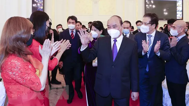 Chủ tịch nước Nguyễn Xuân Phúc gặp gỡ đại diện cộng đồng Việt Nam tại Liên bang Nga. Ảnh: TTXVN