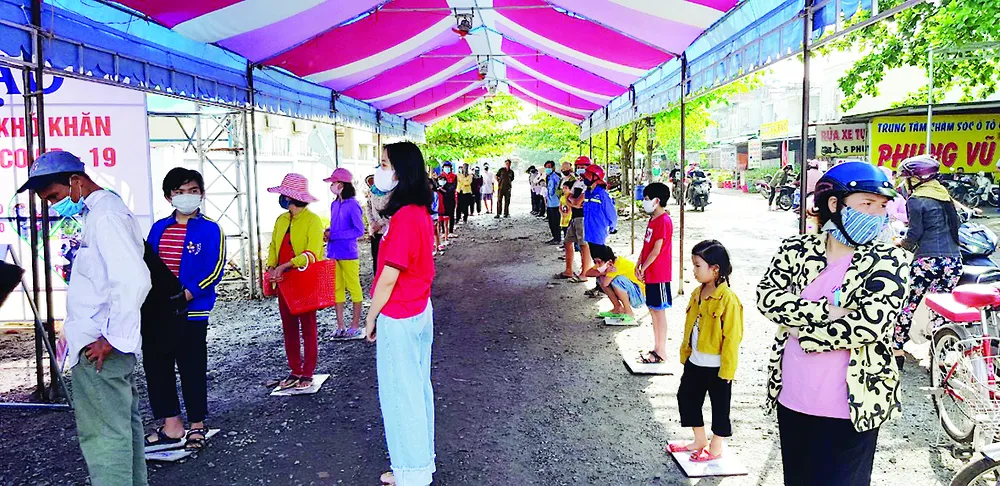 Vedan Việt Nam chung tay nhân rộng mô hình ATM gạo hỗ trợ đồng bào bị ảnh hưởng bởi dịch bệnh Covid-19 ảnh 3