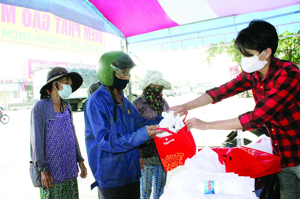 Vedan Việt Nam chung tay nhân rộng mô hình ATM gạo hỗ trợ đồng bào bị ảnh hưởng bởi dịch bệnh Covid-19 ảnh 2