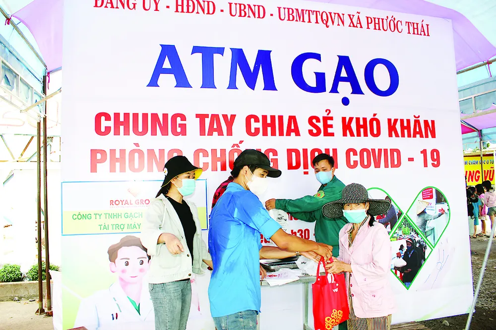 Vedan Việt Nam chung tay nhân rộng mô hình ATM gạo hỗ trợ đồng bào bị ảnh hưởng bởi dịch bệnh Covid-19 ảnh 1