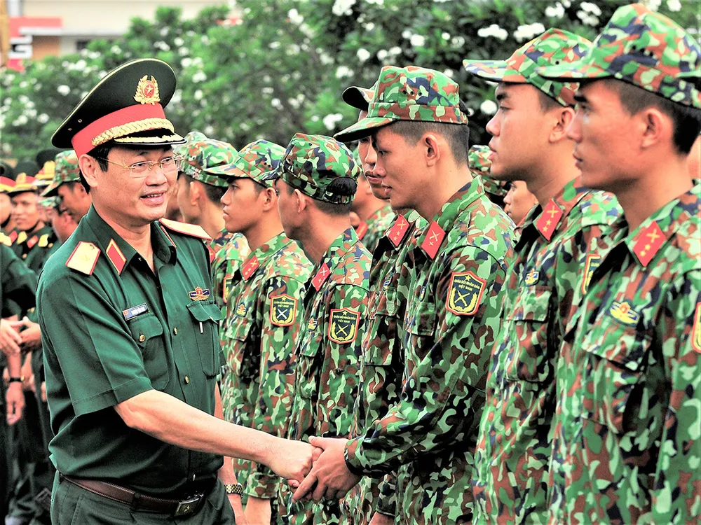 Xây dựng nền quốc phòng toàn dân vững mạnh, khu vực phòng thủ vững chắc ảnh 1