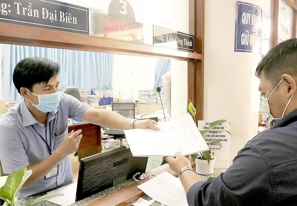 Nhiều xã - phường tại TPHCM: Việc nhiều, cán bộ thiếu ảnh 1