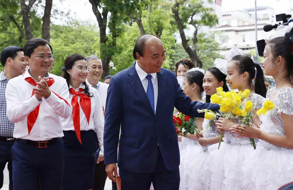 Chủ tịch nước Nguyễn Xuân Phúc  dự Lễ kỷ niệm 65 năm Nhà xuất bản Kim Đồng