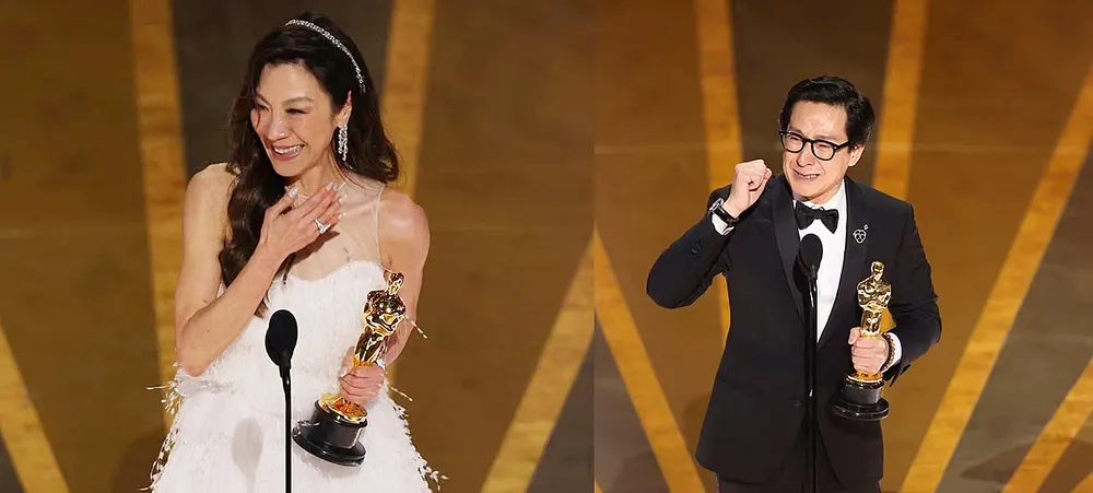 Dương Tử Quỳnh và Quan Kế Huy không kìm nén được cảm xúc khi nhận giải Oscar. Ảnh: REUTERS