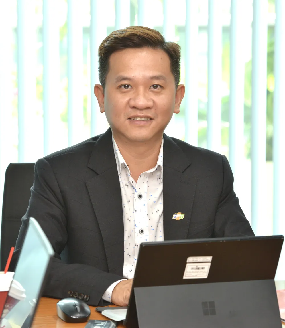 Ông Ngô Minh Trí, Giám đốc đơn vị Giải pháp và Dịch vụ Doanh nghiệp, Công ty TNHH Phần mềm FPT. Ảnh: CAO THĂNG