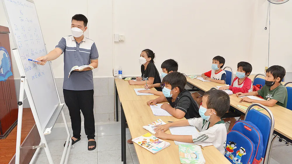 Lớp học tại Trung tâm Học tập cộng đồng phường Cầu Ông Lãnh, quận 1, TPHCM năm học 2023-2024. Ảnh: CAO THĂNG Lớp học tại Trung tâm Học tập cộng đồng phường Cầu Ông Lãnh, quận 1, TPHCM năm học 2023-2024. Ảnh: CAO THĂNG