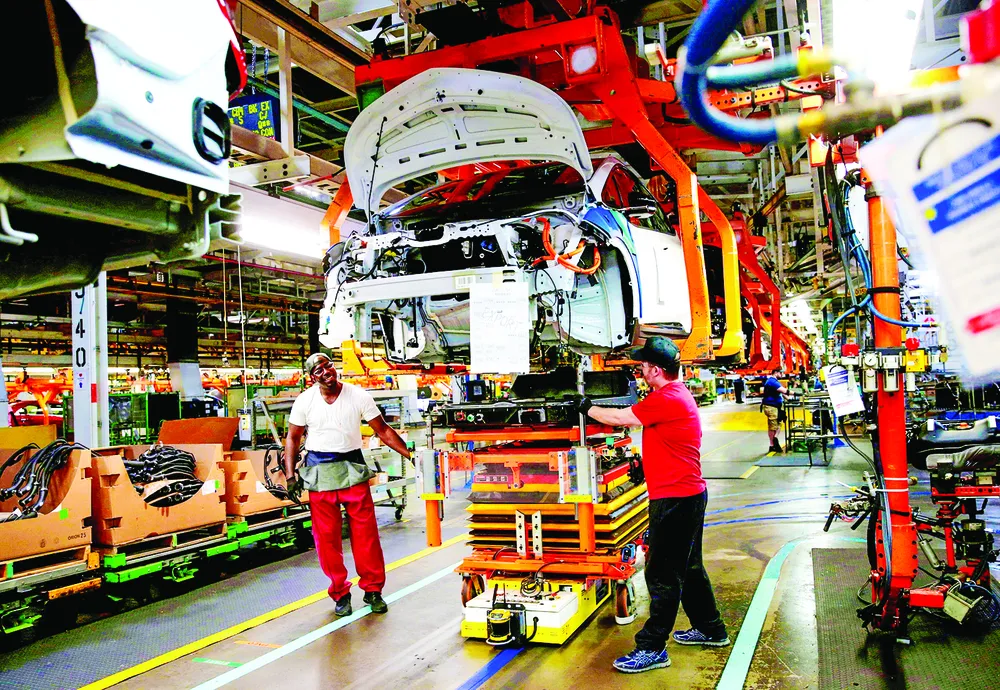 Một dây chuyền sản xuất ô tô tại Mỹ Một dây chuyền sản xuất ô tô tại Mỹ