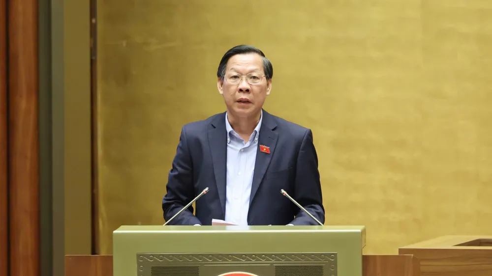 Chủ nhiệm Ủy ban Kinh tế và Tài chính của Quốc hội Phan Văn Mãi trình bày Báo cáo giải trình, tiếp thu, chỉnh lý dự thảo Luật Thuế thu nhập doanh nghiệp (sửa đổi), sáng 12-5. Ảnh: QUANG PHÚC