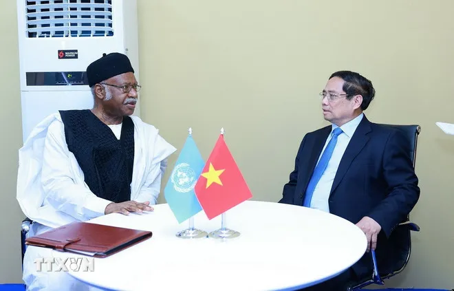 Thủ tướng Phạm Minh Chính gặp Chủ tịch Đại hội đồng Liên hợp quốc khóa 79 Philemon Yang. Ảnh: TTXVN