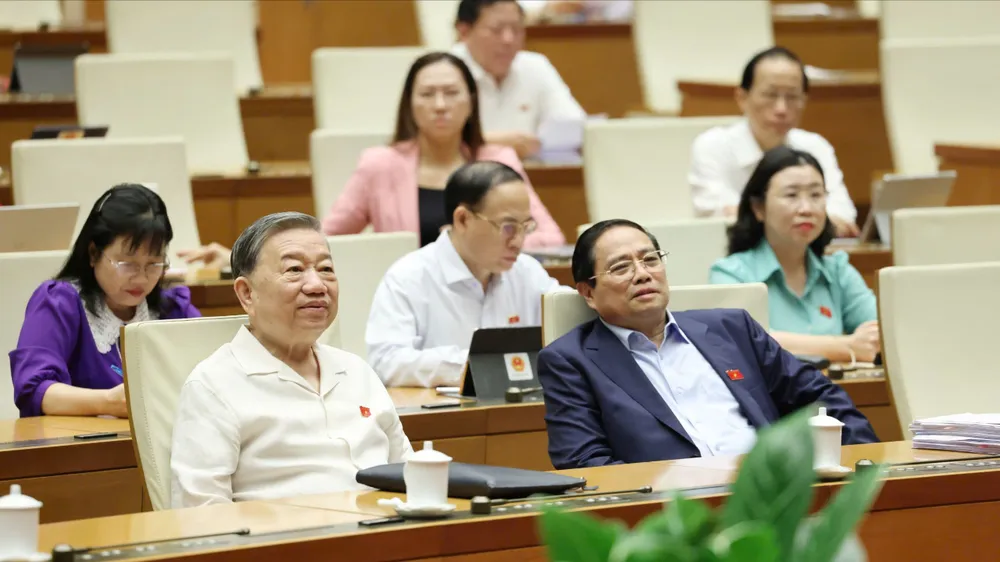 Tổng Bí thư Tô Lâm, Thủ tướng Phạm Minh Chính và các đại biểu dự phiên chất vấn và trả lời chất vấn, sáng 20-6. Ảnh: QUANG PHÚC