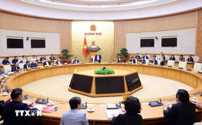 Phó Thủ tướng Thường trực Nguyễn Hòa Bình chủ trì cuộc họp với lãnh đạo các bộ ngành, doanh nghiệp về Dự án đường sắt tốc độ cao trên trục Bắc - Nam. Ảnh: TTXVN