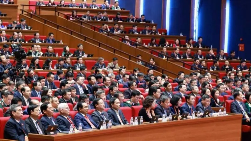 Các đại biểu dự phiên thảo luận, sáng 21-1. Ảnh: VIẾT CHUNG