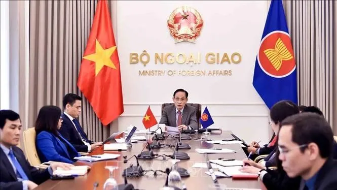 Bộ trưởng Bộ Ngoại giao Lê Hoài Trung phát biểu trực tuyến tại cuộc họp. Ảnh: TTXVN