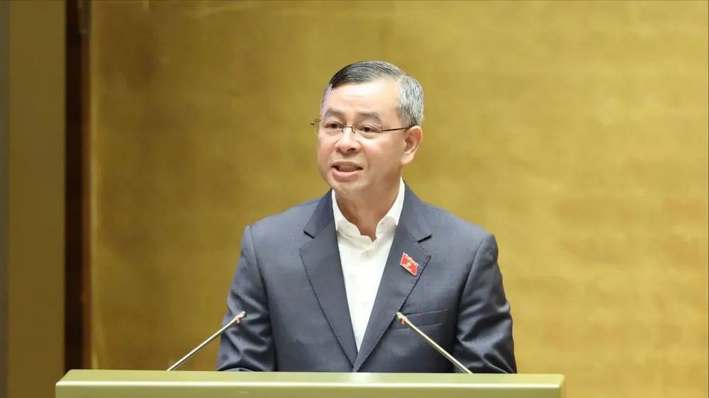 Bộ trưởng Bộ Tài chính Ngô Văn Tuấn phát biểu tiếp thu, giải trình hoàn thiện dự án luật. Ảnh: QUANG PHÚC 