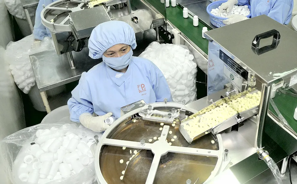 Sản xuất thuốc bình ổn thị trường tại một đơn vị                             . Ảnh: THÀNH TRÍ