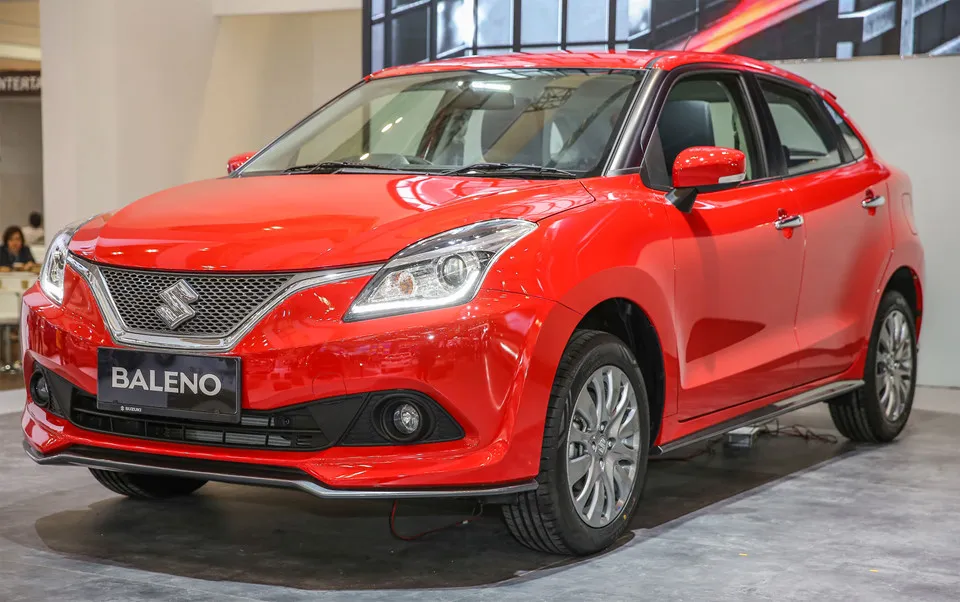 Suzuki vừa chính thức giới thiệu dòng xe Baleno tại triển lãm Gaikindo Indonesia International Auto Show (GIIAS). Baleno được nhập khẩu nguyên chiếc từ Ấn Độ. Hatchback 5 cua Suzuki Baleno gia chi hon 14.000 USD o Indonesia hinh anh 1