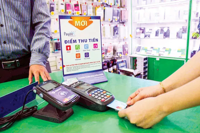 Hạn chế tiền mặt, đặt trong thế khó ảnh 1