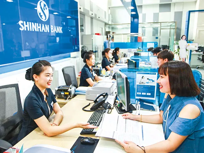 Sức ép ngân hàng nước ngoài ảnh 1