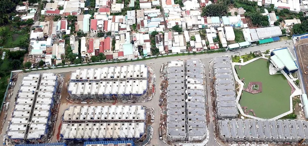 Từ vụ 110 căn biệt thự bị đình chỉ thi công: Tìm cách tháo gỡ cho dự án có “đất xen cài” ảnh 1