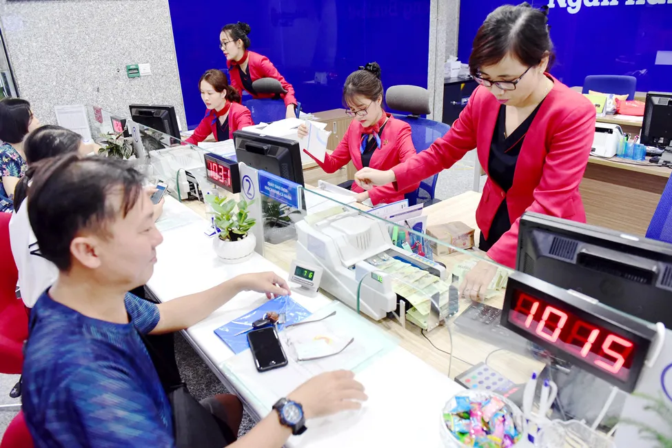 Giảm lãi suất hỗ trợ tăng trưởng kinh tế ảnh 1