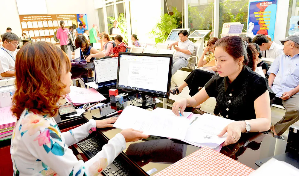 Chuyển mạnh sang thủ tục trực tuyến để giảm tham nhũng vặt ảnh 1