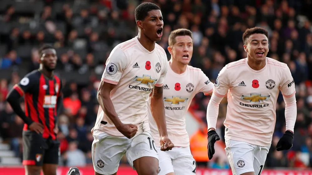 Rashford ăn mừng bàn thắng phút cuối