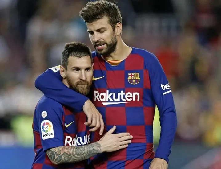 Gerard Pique và Leo Messi