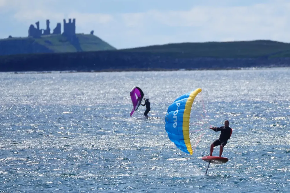 wind-surfers-beadnell-bay-northumberland-1091705154.jpg