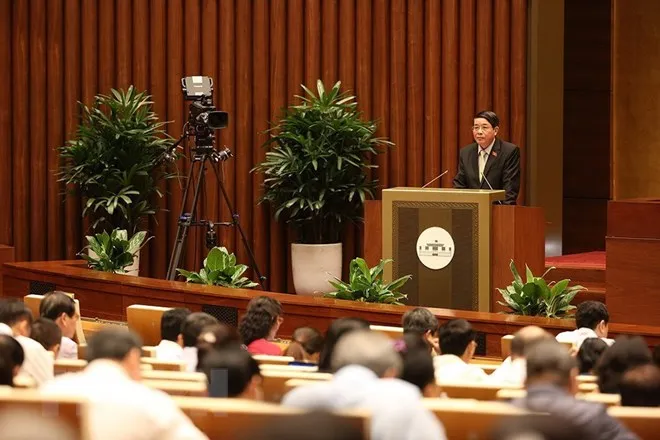 Chủ nhiệm Ủy ban Tài chính-Ngân sách của Quốc hội Nguyễn Đức Hải trình bày Báo cáo giải trình, tiếp thu và chỉnh lý dự thảo Nghị quyết về phê chuẩn quyết toán ngân sách Nhà nước năm 2016. (Ảnh: Dương Giang/TTXVN)