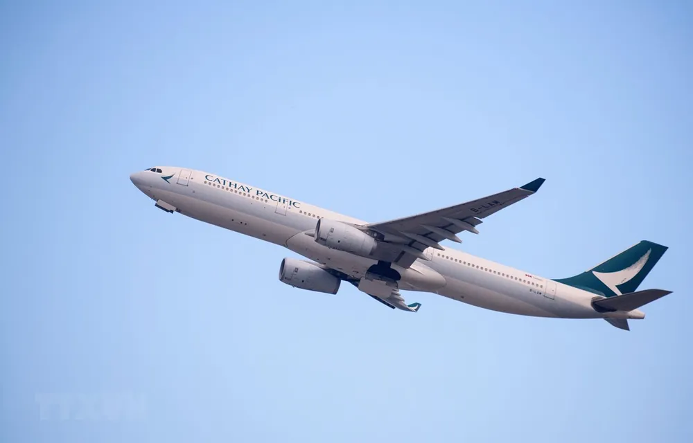 Máy bay của hãng hàng không Cathay Pacific cất cánh từ sân bay quốc tế Hong Kong, Trung Quốc ngày 7/8/2018. (Ảnh: AFP/ TTXVN)
