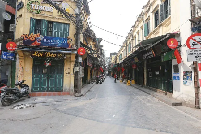 Những hình ảnh toàn dân phòng chống dịch tại Hà Nội và TPHCM ảnh 4