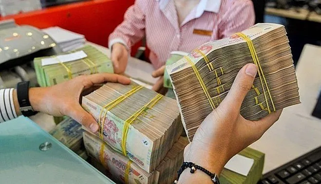 Lãi suất có thể tiếp tục giảm từ nay đến cuối năm. (Ảnh minh họa: KT)