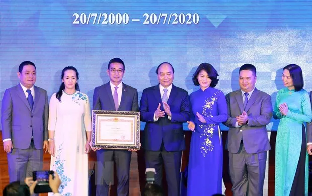 Thu tuong danh cong ky niem 20 nam hoat dong thi truong chung khoan hinh anh 1