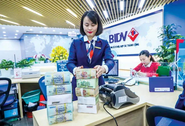 Tính toán để VNĐ tăng 1-2% so với USD ảnh 2