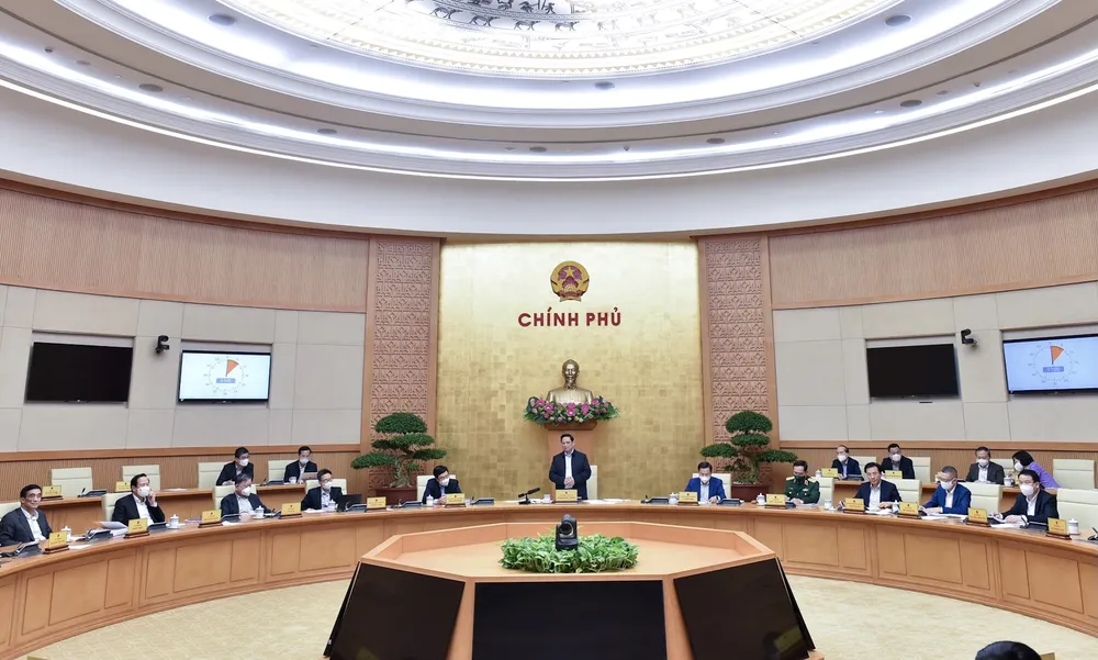 Các ý kiến tại cuộc họp thống nhất đánh giá, hoạt động sản xuất, kinh doanh tiếp tục phục hồi trong trạng thái bình thường mới, khẳng định ý nghĩa quan trọng, sự đúng hướng, kịp thời, hiệu quả của việc ban hành Nghị quyết 128/NQ-CP - Ảnh: VGP/Nhật Bắc