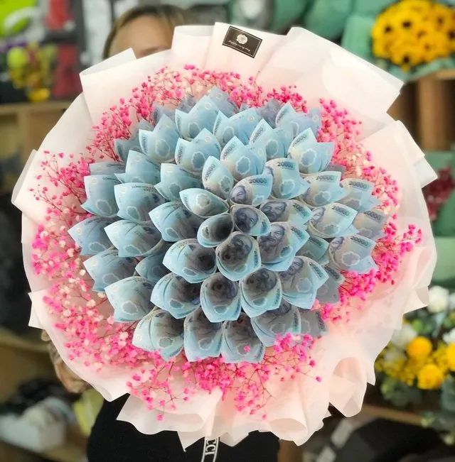 Nhiều khách hàng ưa chuộng những "bó hoa tiền" đẹp mắt
