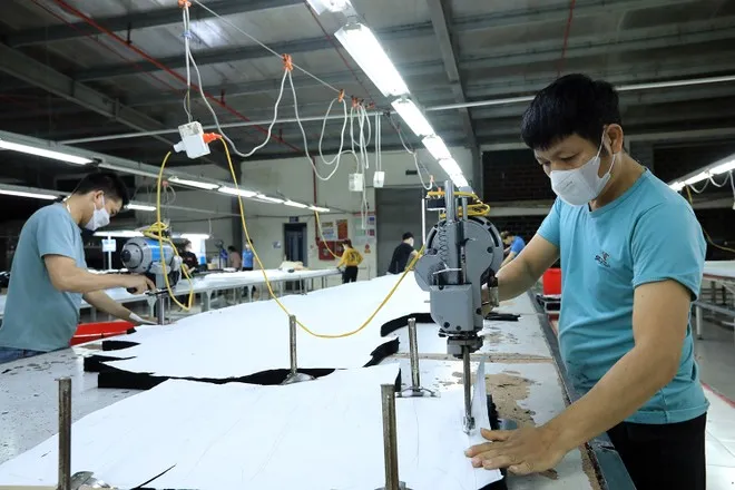 Chủ động từ khâu thiết kế để tăng giá trị xuất khẩu. (Ảnh: Đức Duy/Vietnam+)