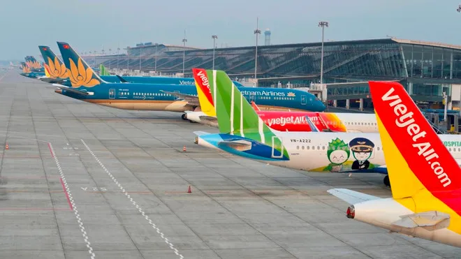 Máy bay của các hãng hàng không Việt Nam tại Sân bay Quốc tế Nội Bài. (Ảnh: PV/Vietnam+)