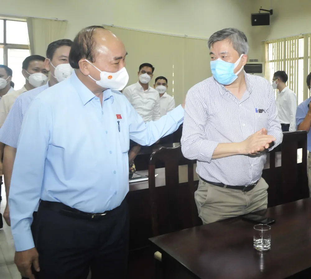 Chủ tịch nước Nguyễn Xuân Phúc: Sớm đưa huyện Hóc Môn thành đô thị phía Tây của TPHCM ảnh 3