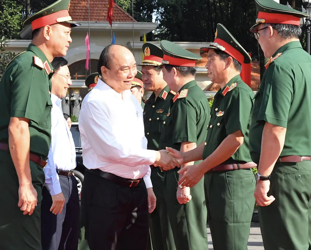 Chủ tịch nước chủ trì hội thảo khoa học lý luận, thực tiễn bảo vệ Tổ quốc trong tình hình mới ảnh 1