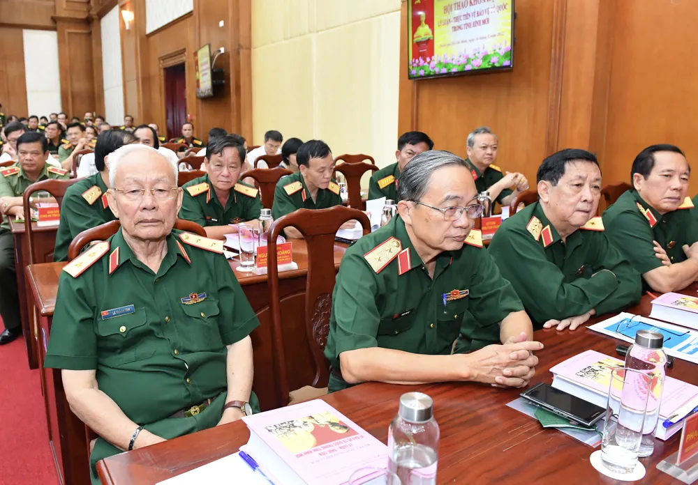 Chủ tịch nước chủ trì hội thảo khoa học lý luận, thực tiễn bảo vệ Tổ quốc trong tình hình mới ảnh 5