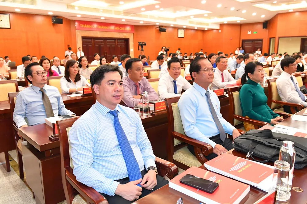 Đại biểu dự hội nghị sơ kết giữa nhiệm kỳ. Ảnh: VIỆT DŨNG