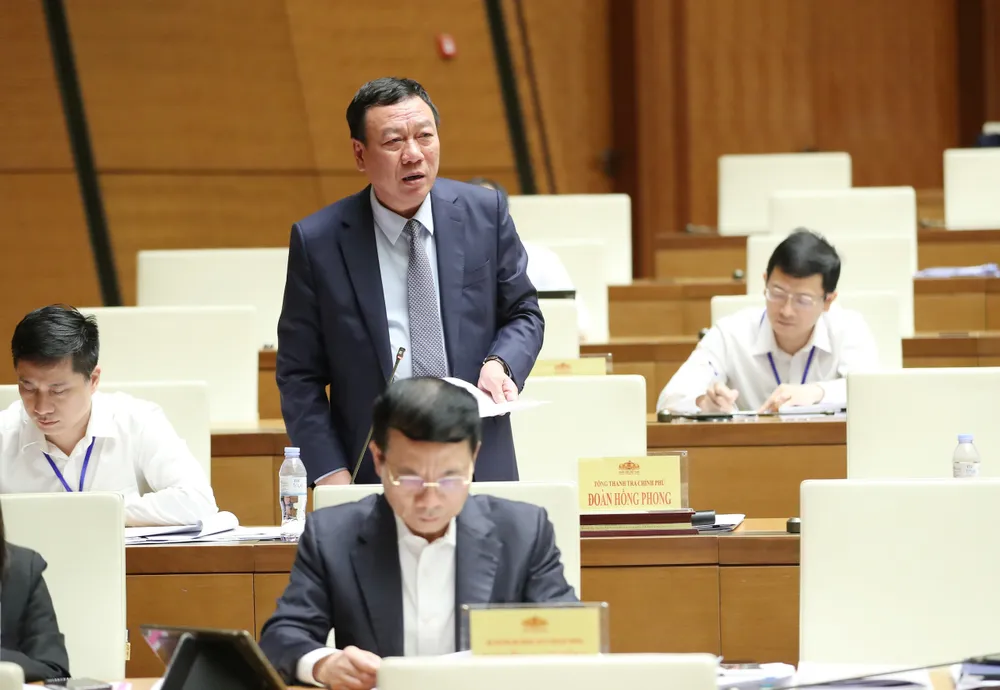 Tổng Thanh tra Chính phủ trả lời chất vấn. Ảnh: QUANG PHÚC Tổng Thanh tra Chính phủ trả lời chất vấn. Ảnh: QUANG PHÚC