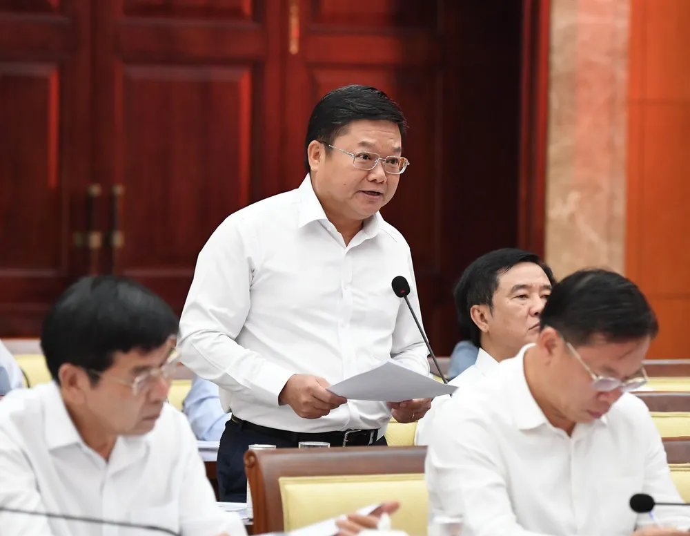 Giám đốc Sở LĐTB-XH TPHCM Lê Văn Thinh phát biểu tại hội nghị. Ảnh: VIỆT DŨNG